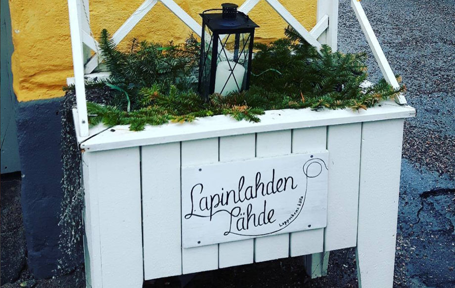 Lapinlahden lähteen kyltti.