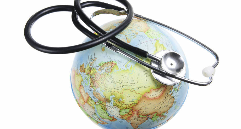 Stetoskooppi ja maapallo.