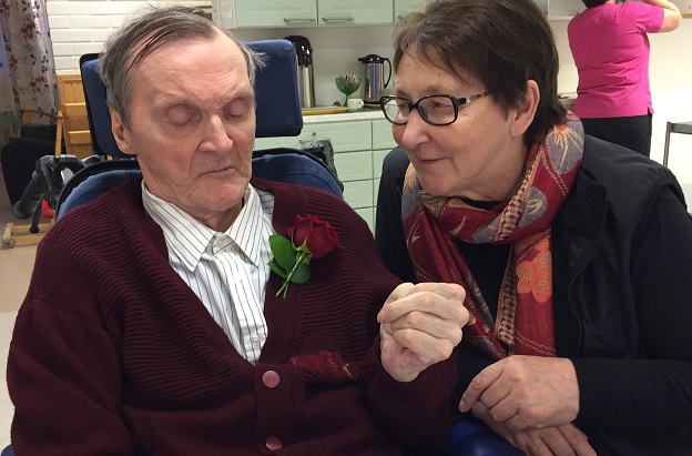 Oula Magga sitting with his wife Ristenrauna Magga.