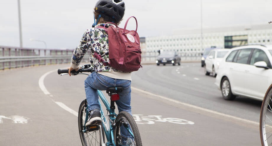 The child is cycling.