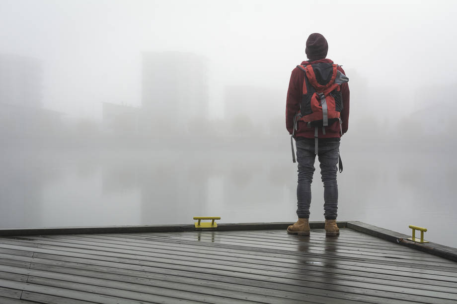 A man standing on the roof.