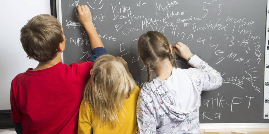 children at the whiteboard.