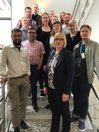 Group photo on the stairs.