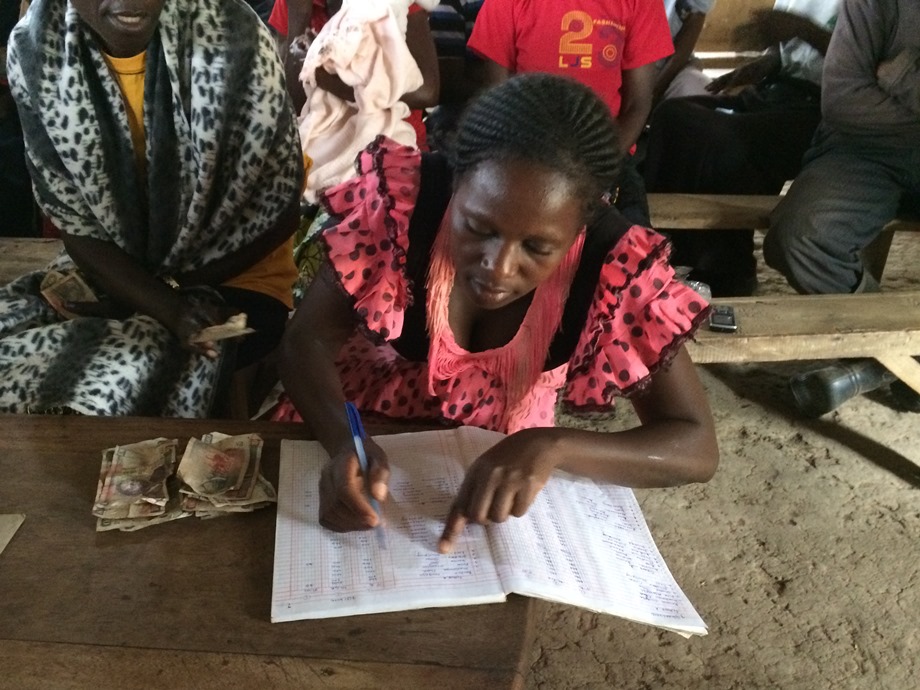 Secretary of the savings group making calculations