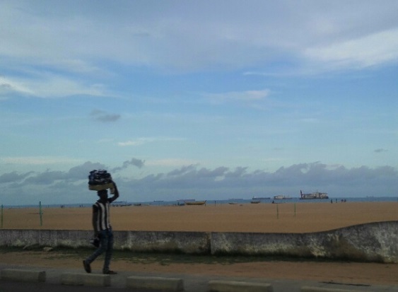 Man walking near the beach in Lome, Togo.