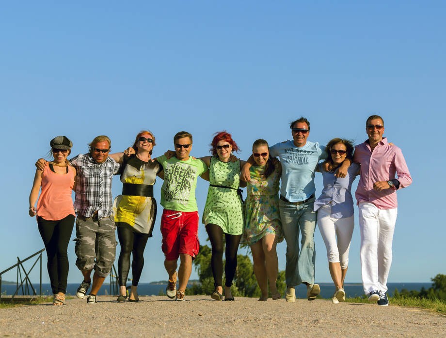 Happy people together outside.